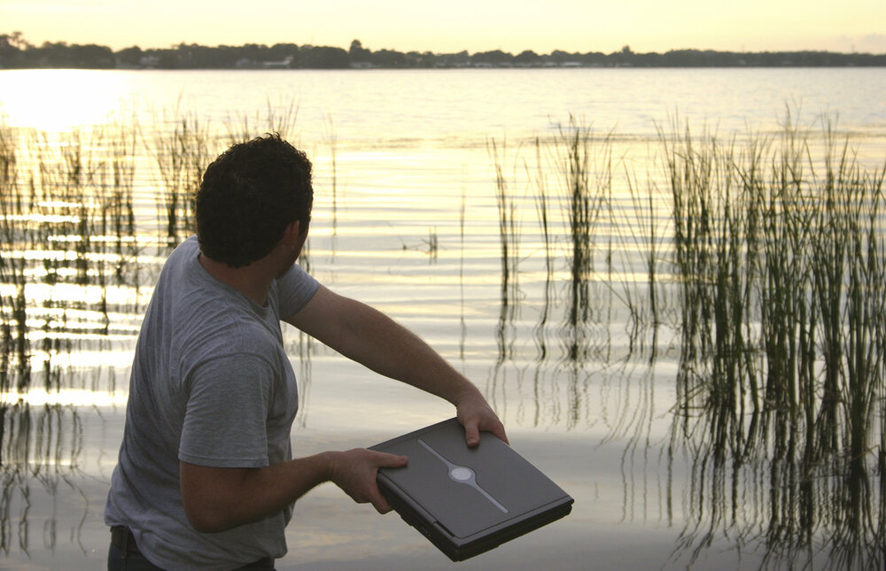 man throwing computer out.jpg
